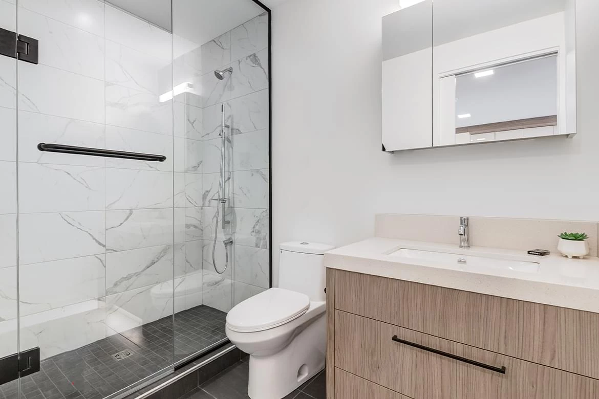 Studio suite bathrooms include quartz countertops & chrome fixtures