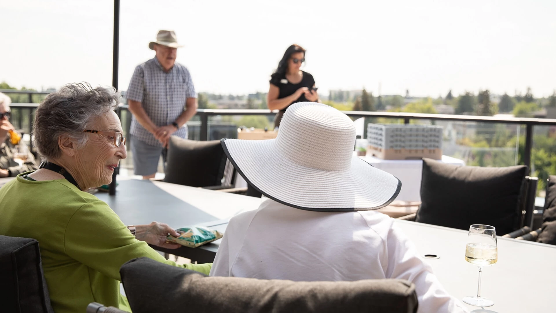 Seniors visiting on a rooftop