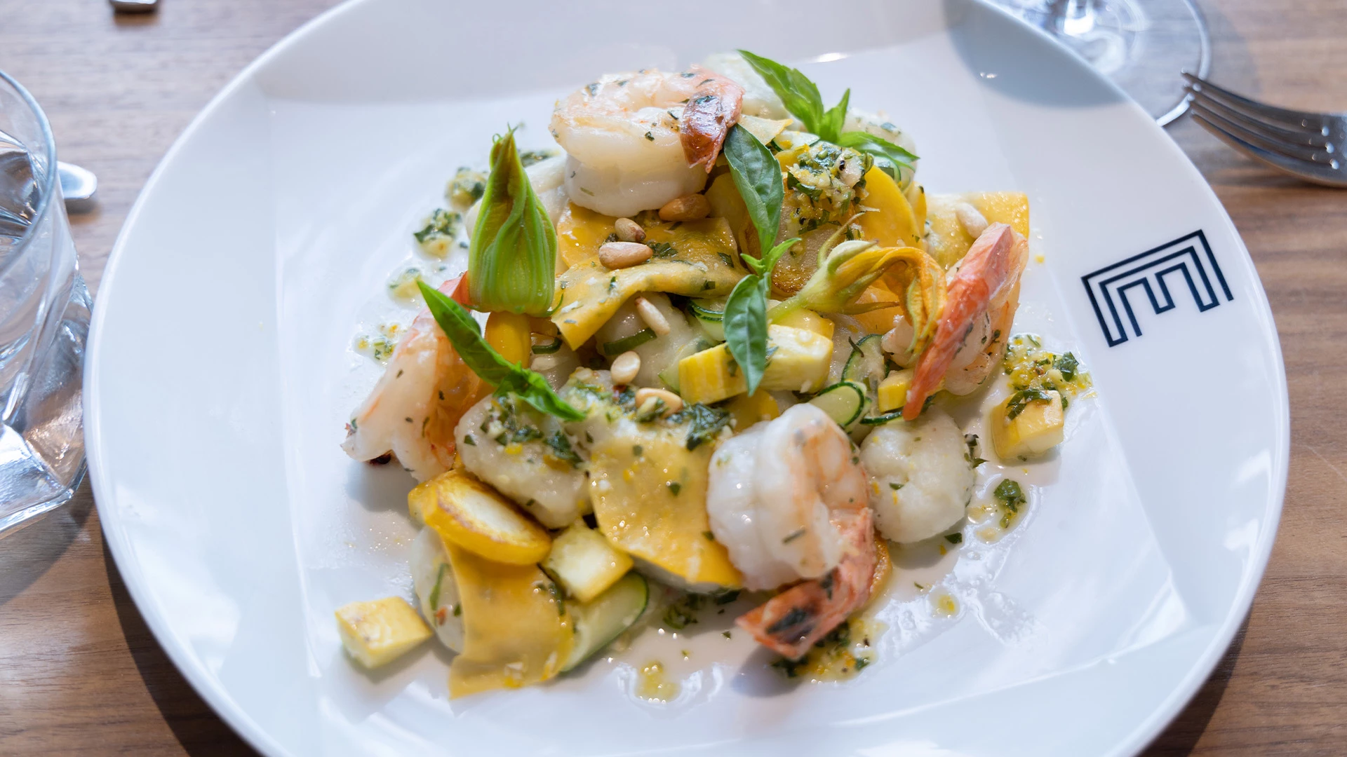 Plated meal of prawns and egg noodles